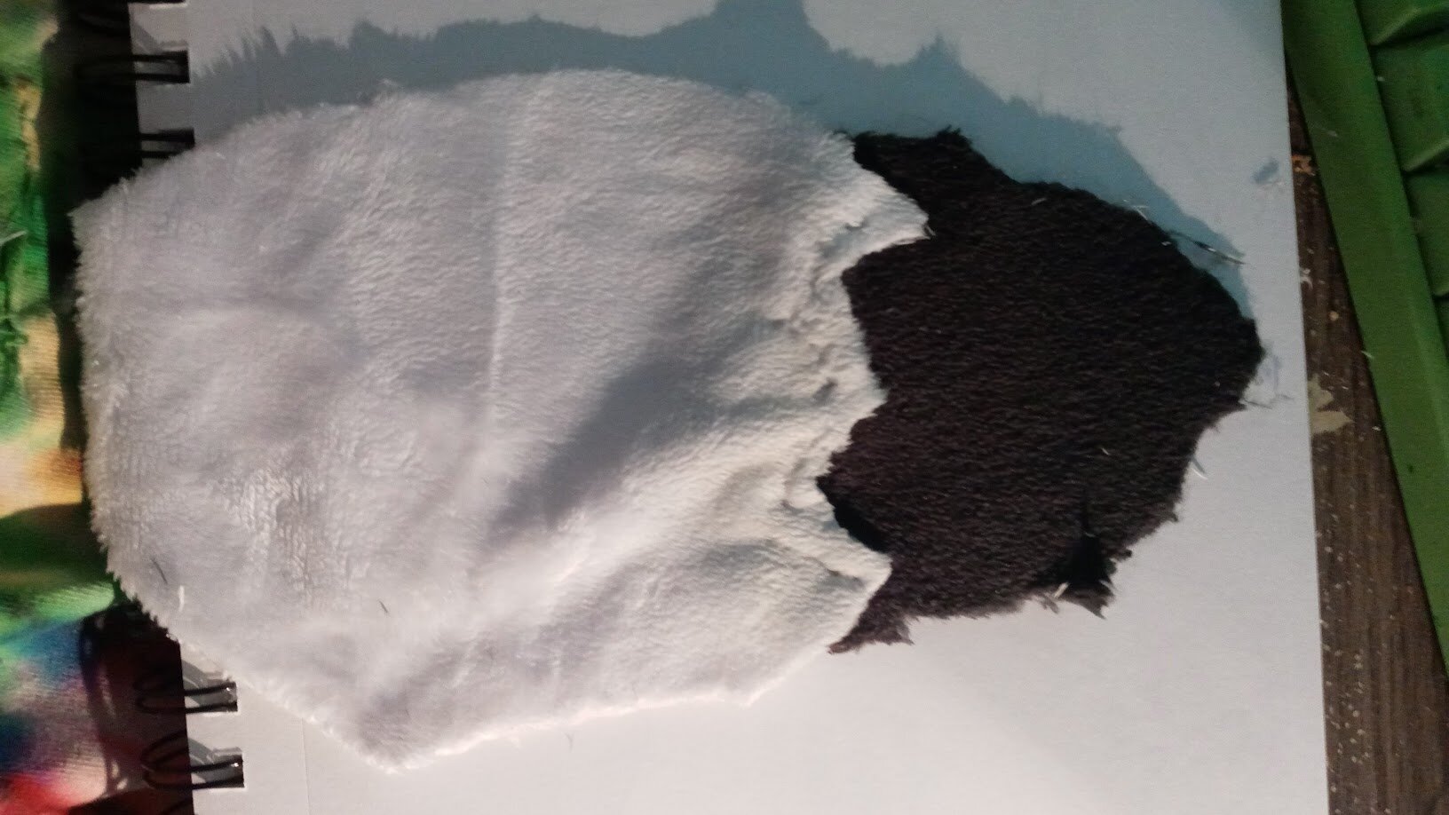 a white tail pattern with a black tailtip, before being sewn and flipped inside-out. the black pattern is sewn on each side of the tail... which is to say, one on each of the two sides... sorry, that makes it more confusing. it's TWO PIECES!!!!