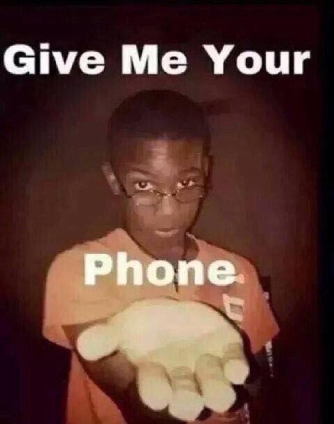 meme of a kid, with his palm up, asking for your phone, with bold impact font text that says 'GIVE ME YOUR PHONE'.